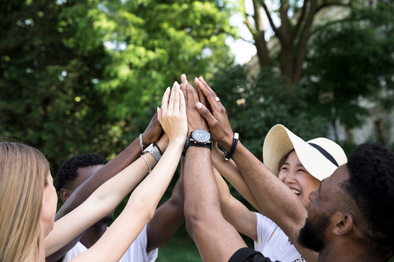front-view-interracial-friends-cheering
